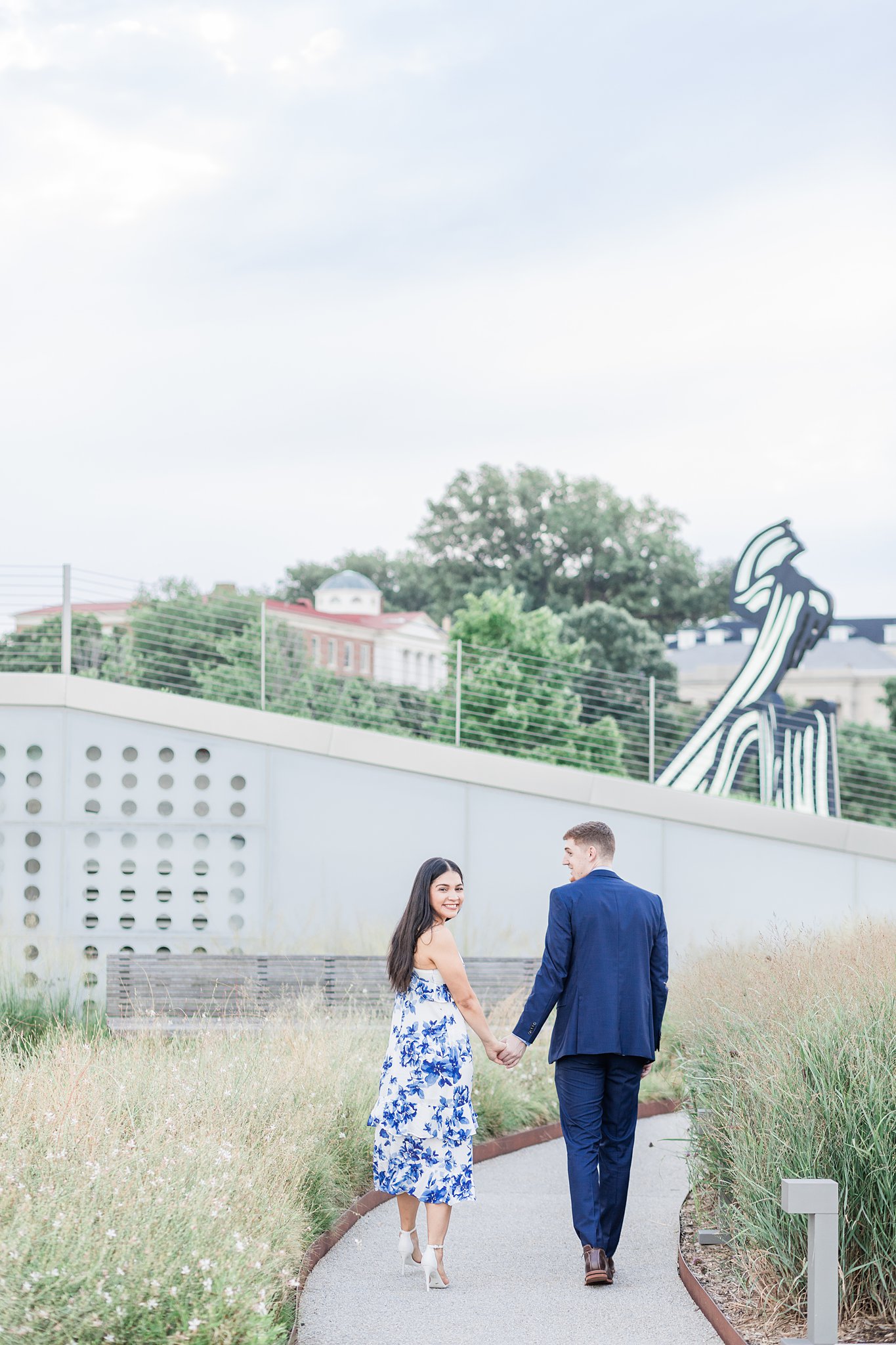Blue dress engagement photo ideas in Washington DC gardens at the Kennedy Center