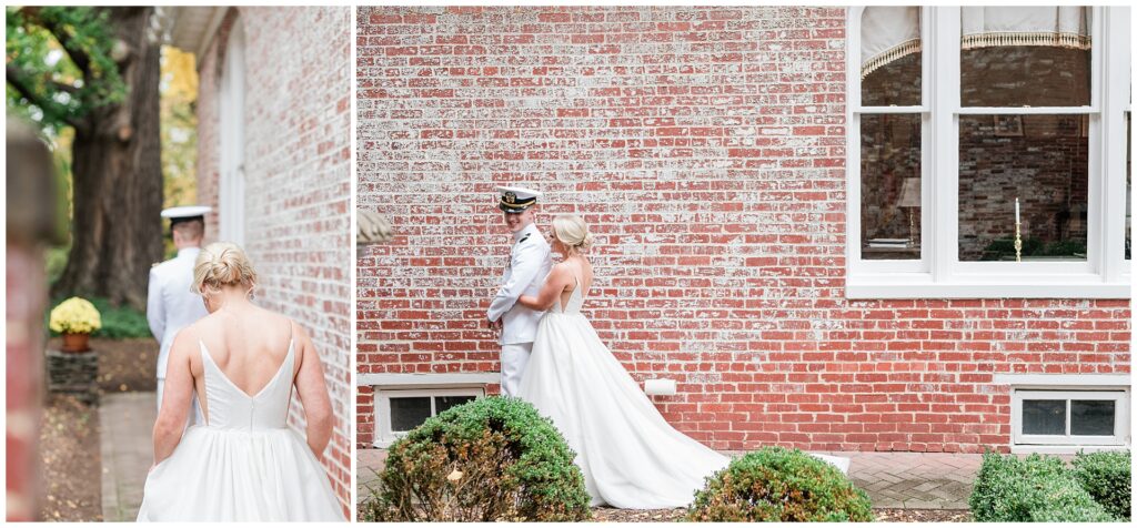 Naval officer groom and bride share intimate first look moment against historic brick backdrop, classic military wedding portraits in downtown Frederick