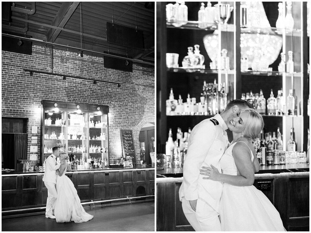 Black and white romantic portraits of naval officer and bride at historic Union Mills Public House bar, timeless wedding moments in downtown Frederick