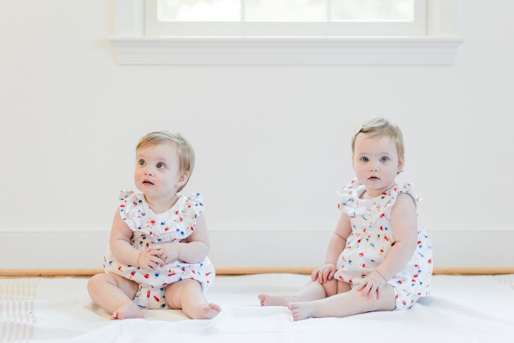 One-year-old twin girls during a milestone family session in Montgomery County, Maryland.