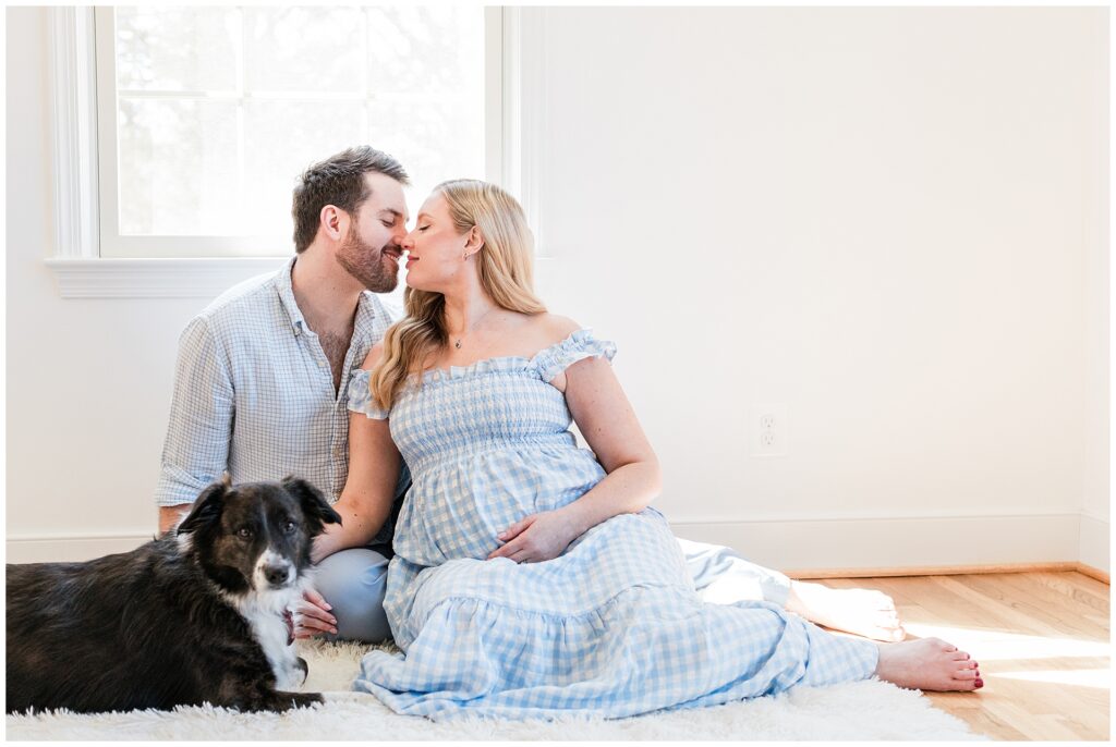 Pregnant mother in a blue gingham maternity dress during an at-home photo session in Montgomery County, Maryland.