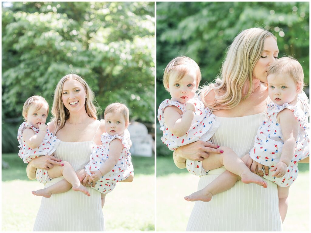 Mom holding her one-year-old twin girls during a milestone family session in Montgomery County, Maryland.