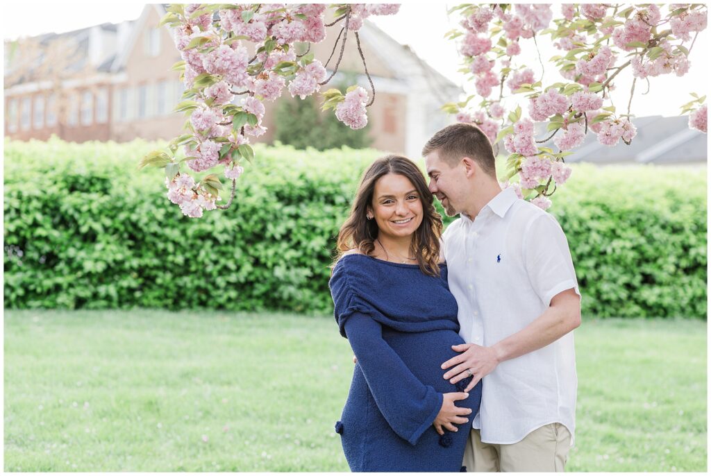 Maryland maternity mini session with cherry blossoms in Howard County