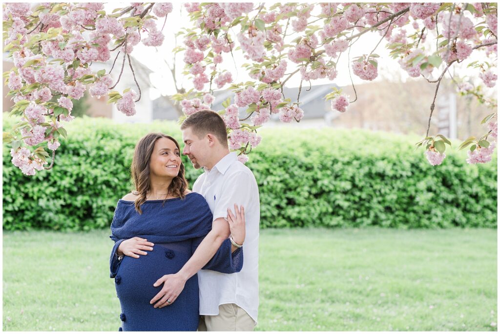 Howard County maternity photographer capturing late pregnancy in spring bloom