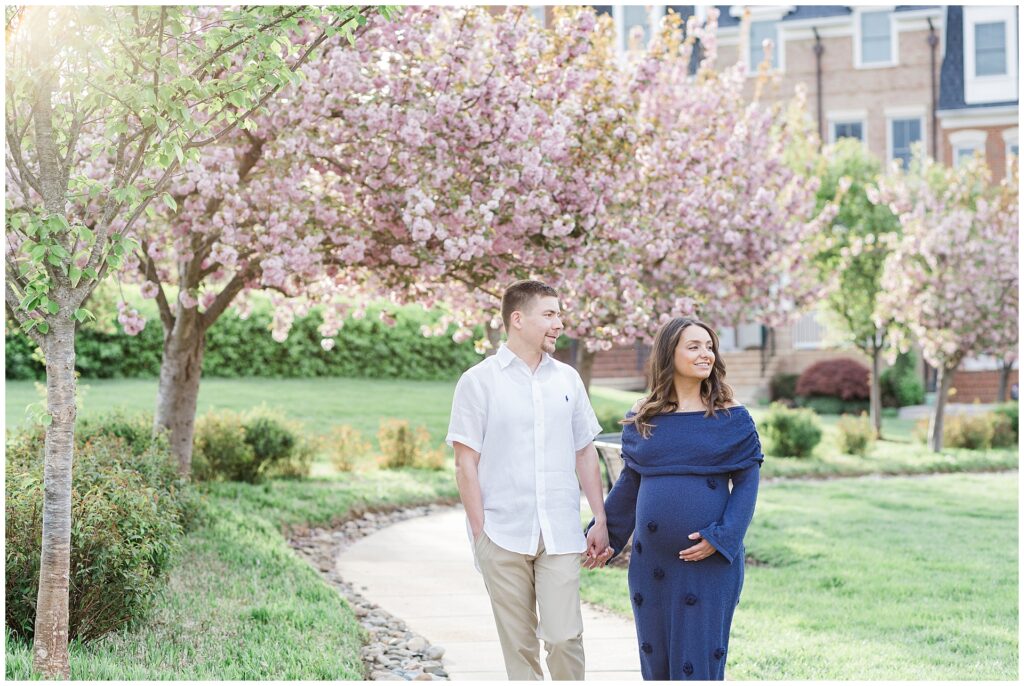 Maryland maternity mini session with cherry blossoms in Howard County