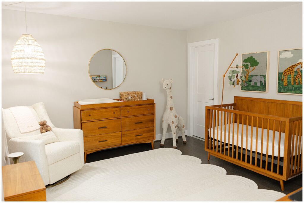 Safari themed nursery featuring West Elm dresser and crib