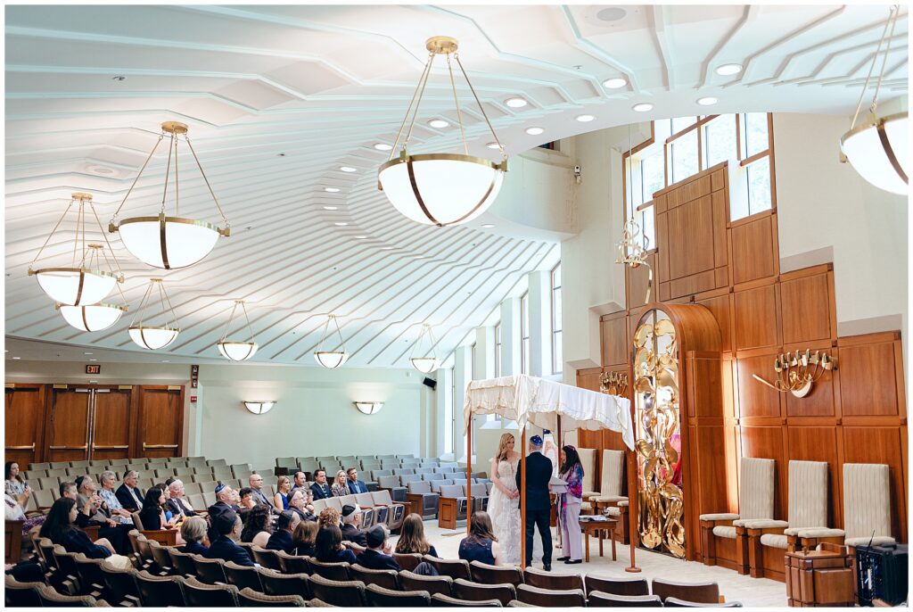 Couple under the huppah during their Jewish Wedding Ceremony at Washington Hebrew Congregation in Washington DC
